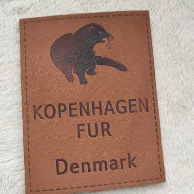 Customizable Embossed Leather Patches using eco friendly top grain leather with blind embossing and color filled embossing techniques for finish