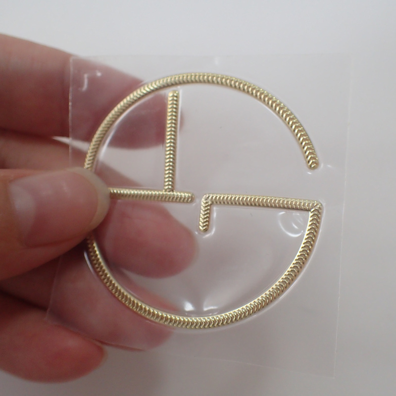 Custom Logo 3D Shiny Gold Silver PVC Silicone Heat Transfer Labels for Garment and Bags