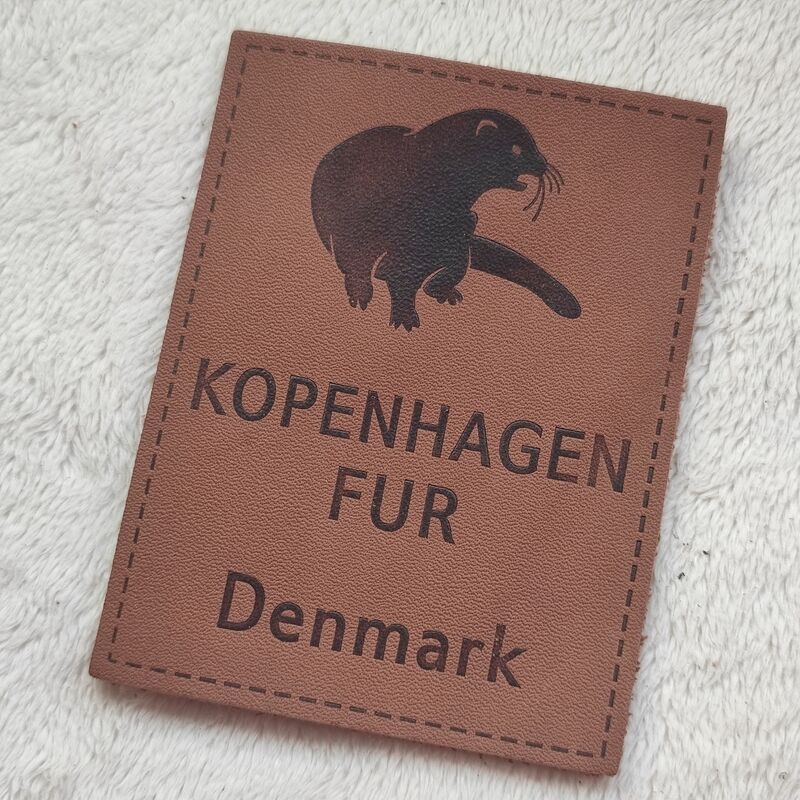 Customizable Embossed Leather Patches using eco friendly top grain leather with blind embossing and color filled embossing techniques for finish